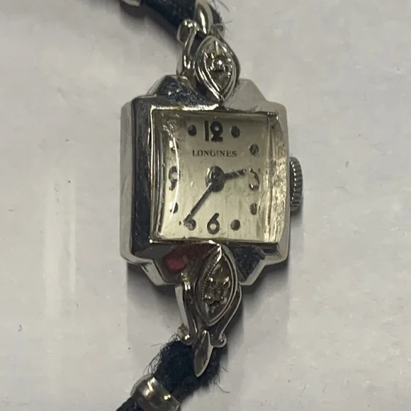 14k and diamonds Longines women watch